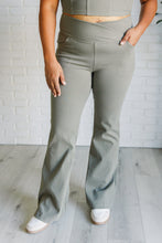 Load image into Gallery viewer, Building Habits Twill Flared Crossover Waist Pant in Dusty Olive