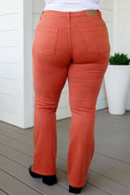 Load image into Gallery viewer, Autumn Mid Rise Slim Bootcut Jeans in Terracotta
