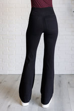 Load image into Gallery viewer, Building Habits Twill Flared Crossover Waist Pant in Black
