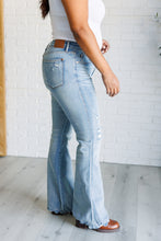 Load image into Gallery viewer, Caroline Mid Rise Control Top Distressed Flare Jeans
