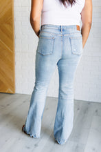 Load image into Gallery viewer, Caroline Mid Rise Control Top Distressed Flare Jeans
