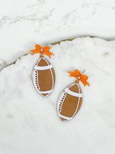 Load image into Gallery viewer, PREORDER: Football Bow Drop Earrings in Two Colors
