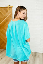 Load image into Gallery viewer, In the Rotation Exposed Seam Tee in Aqua

