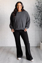 Load image into Gallery viewer, Building Habits Twill Flared Crossover Waist Pant in Black
