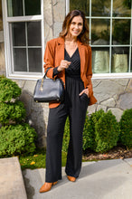 Load image into Gallery viewer, Onward &amp; Upward Faux Wrap Jumpsuit In Black
